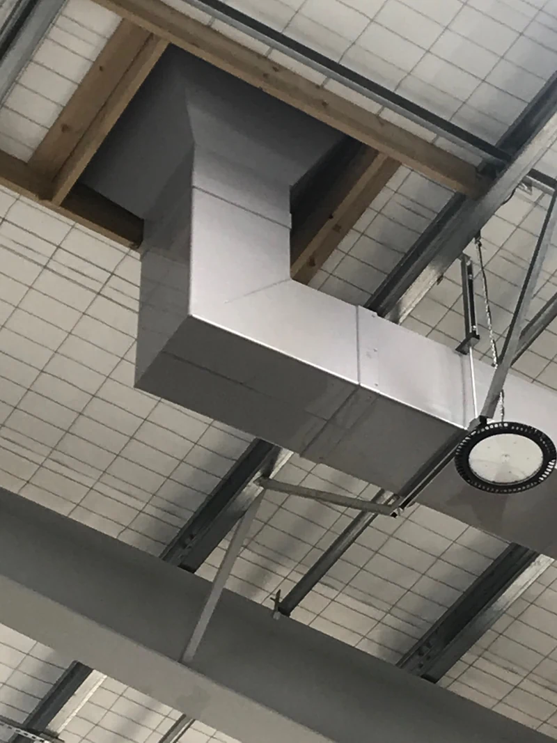 Overhead extraction ductwork inside a building
