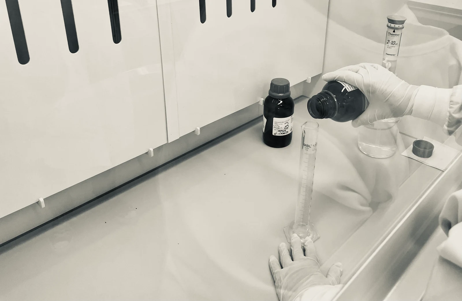 Chemical fume cupboard with a front working opening in a laboratory